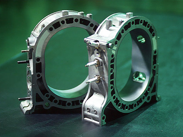 REVOLUTION CROSS PORT HOUSING FOR MAZDA RX-7 FD3S RFD3-KH