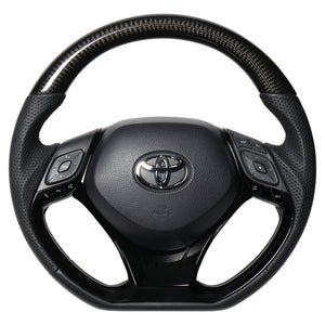 REAL ORIGINAL SERIES SET COMBINATION TYPE + UNDER PAD SET BLACK CARBON STEERING + PIANO BLACK UNDER PAD BLACK EURO STITCH STEERING WHEEL FOR TOYOTA C-HR 10 50  X10-BKC-PBP-PBP