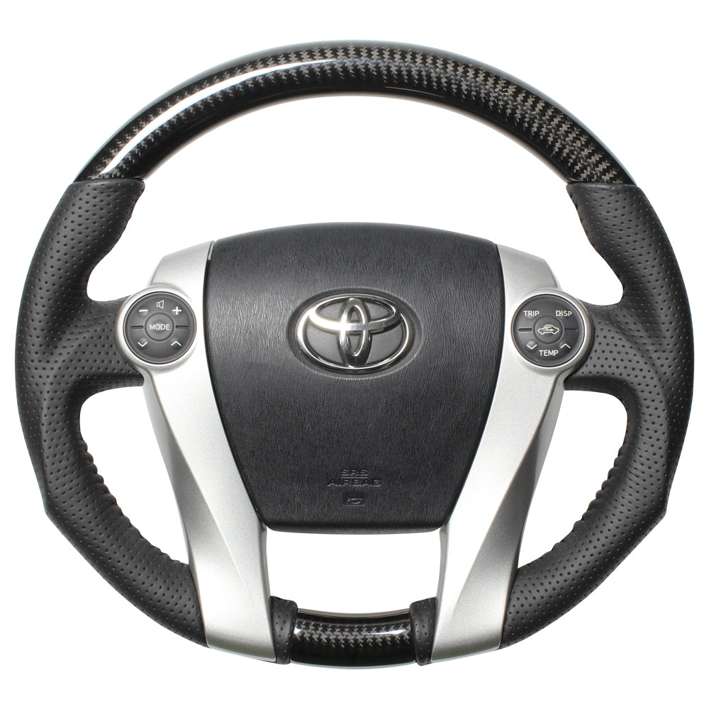 REAL ORIGINAL SERIES OVAL SHAPE BLACK CARBON BLACK STITCH STEERING WHEEL FOR TOYOTA PRIUS PHV 30  30-2-BKC