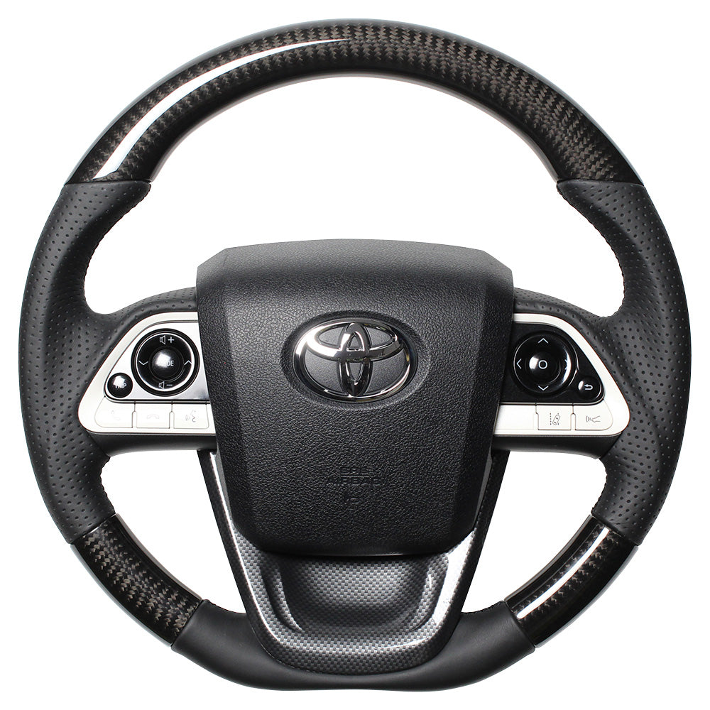 REAL PREMIUM SERIES SET BLACK CARBON STEERING + BLACK CARBON PRINT UNDER PAD BLACK EURO STITCH STEERING WHEEL FOR TOYOTA PRIUS PHV 50  50P-BKC-BK-BKT