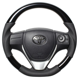 REAL ORIGINAL SERIES D SHAPE PIANO BLACK BLACK STITCH STEERING WHEEL FOR TOYOTA COROLLA AXIO 160  E160-PBW-BK