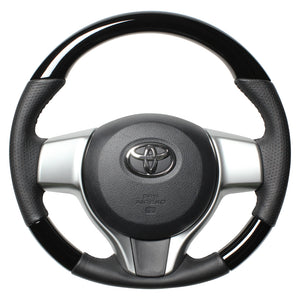 REAL ORIGINAL SERIES SOFT D SHAPE PIANO BLACK BLACK STITCH STEERING WHEEL FOR TOYOTA RACTIS 120  P130-PBW-BK
