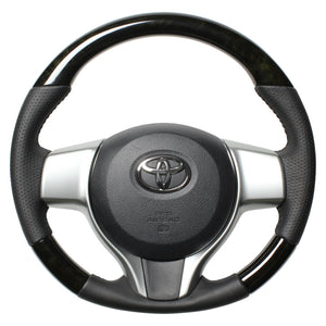 REAL ORIGINAL SERIES SOFT D SHAPE BLACK WOOD BLACK STITCH STEERING WHEEL FOR TOYOTA VITZ GR SPORT 130  P130-BKW-BK