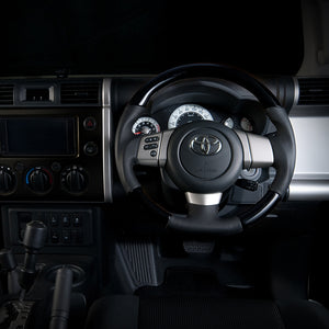 REAL ORIGINAL SERIES SOFT D SHAPE PIANO BLACK BLACK STITCH STEERING WHEEL FOR TOYOTA FJ CRUISER GSJ15W FJ-PBW-BK
