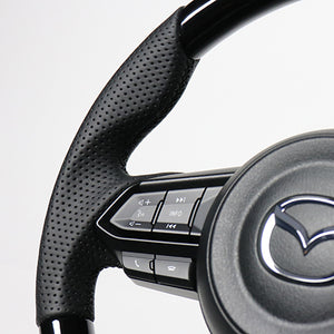 REAL ORIGINAL SERIES SOFT D SHAPE PIANO BLACK BLACK EURO STITCH STEERING WHEEL FOR MAZDA MAZDA2 DJ  MZD-PBW-BK