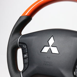 REAL ORIGINAL SERIES ROUND SHAPE ORANGE ORANGE X BLACK EURO STITCH STEERING WHEEL FOR MITSUBISHI PAJERO V8 W V9 W  D5-ORW-OR