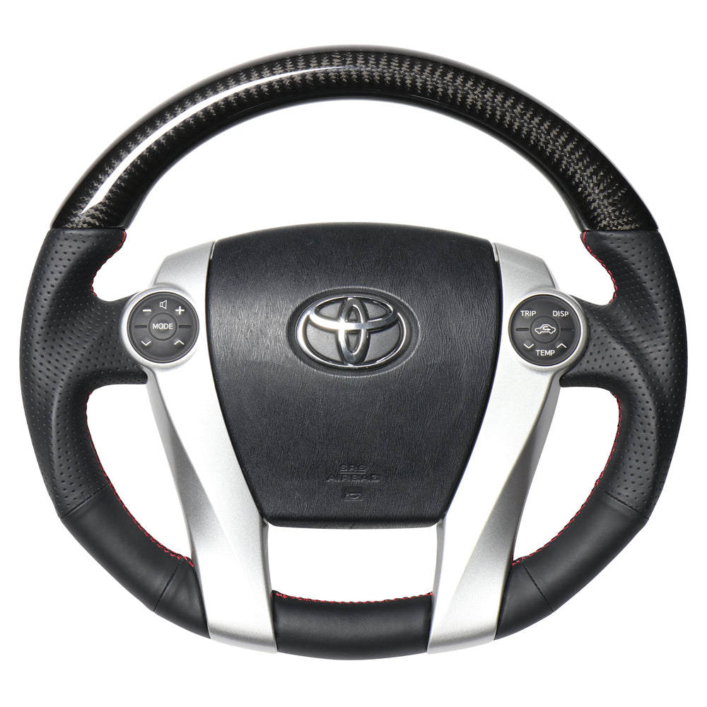 REAL PREMIUM SERIES OVAL SHAPE BLACK CARBON RED X BLACK EURO STITCH STEERING WHEEL FOR TOYOTA AQUA NHP10  30-BS-BKC-RD