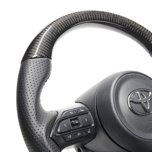 REAL ORIGINAL SERIES D SHAPE BLACK CARBON BLACK STITCH STEERING WHEEL FOR TOYOTA YARIS 10 210  TYE-BKC-BK