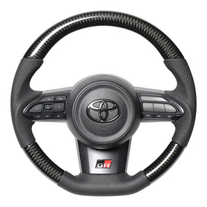 REAL ORIGINAL SERIES SOFT D SHAPE BLACK CARBON SILVER X BLACK EURO STITCH STEERING WHEEL FOR TOYOTA GR COROLLA GZEA14H  TYI-BKC-SL