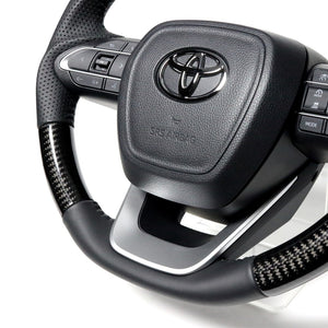 REAL ORIGINAL SERIES D SHAPE BLACK CARBON BLACK STITCH STEERING WHEEL FOR TOYOTA NOAH 90  TYK-BKC