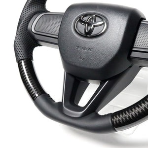 REAL ORIGINAL SERIES SOFT D SHAPE BLACK CARBON BLACK STITCH STEERING WHEEL FOR DAIHATSU TANTO FAN CROSS LA650S LA660S  DIB-BKC-BK