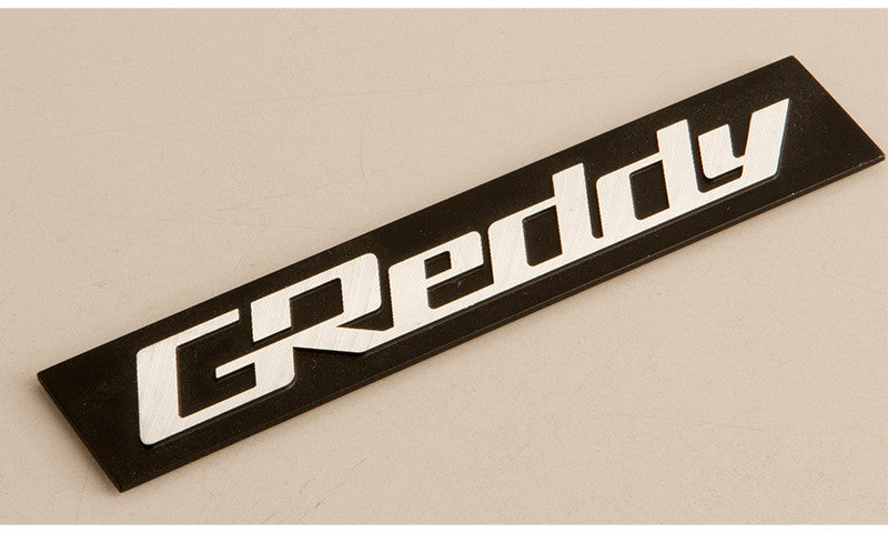 GREDDY ALUMINUM EMBLEM, BLACK AND SILVER FOR   18000202