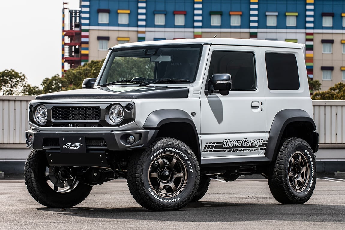 SHOWA GARAGE ABS FRONT BUMPER SPOILER UNPAINTED WITH HEADLIGHT WASHER FOR SUZUKI JIMNY JB74W E00600-JC